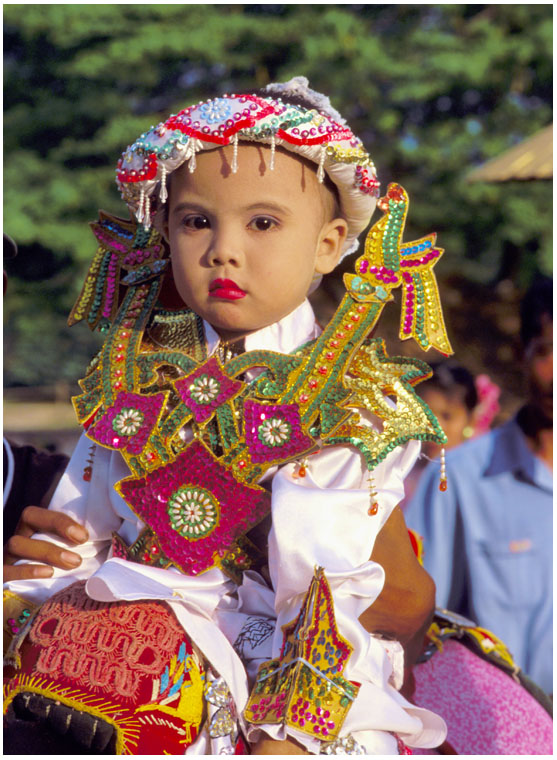 child dressed for entry at a monastery, novice ceremony